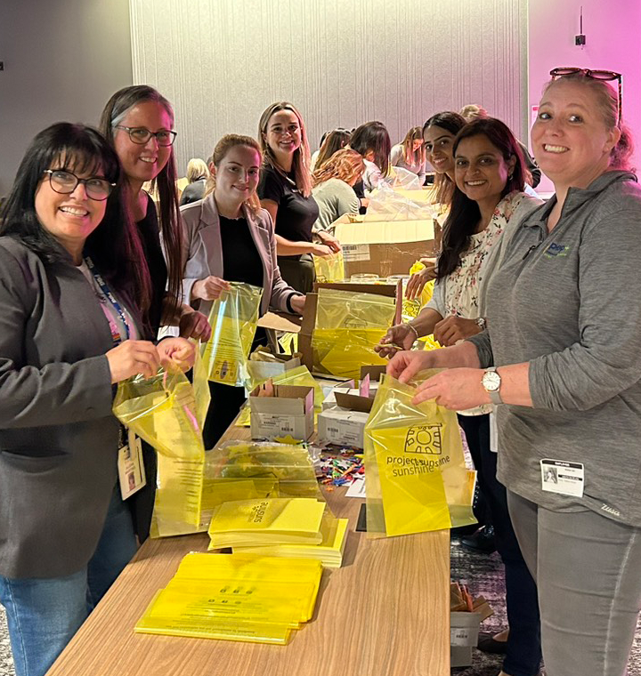 Employees packing meal bags