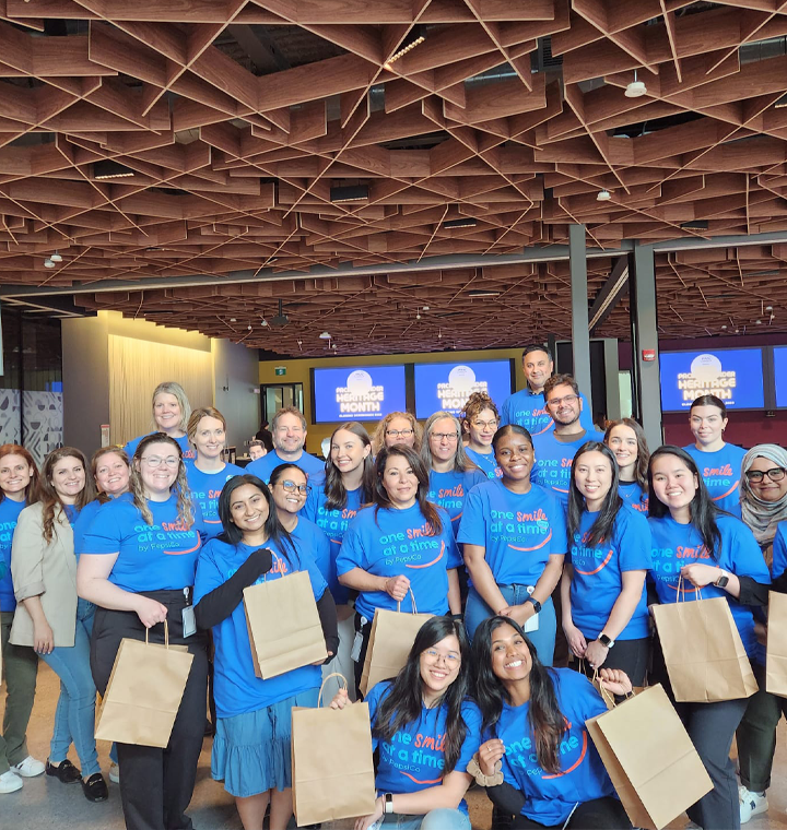 Employees at a food packing event